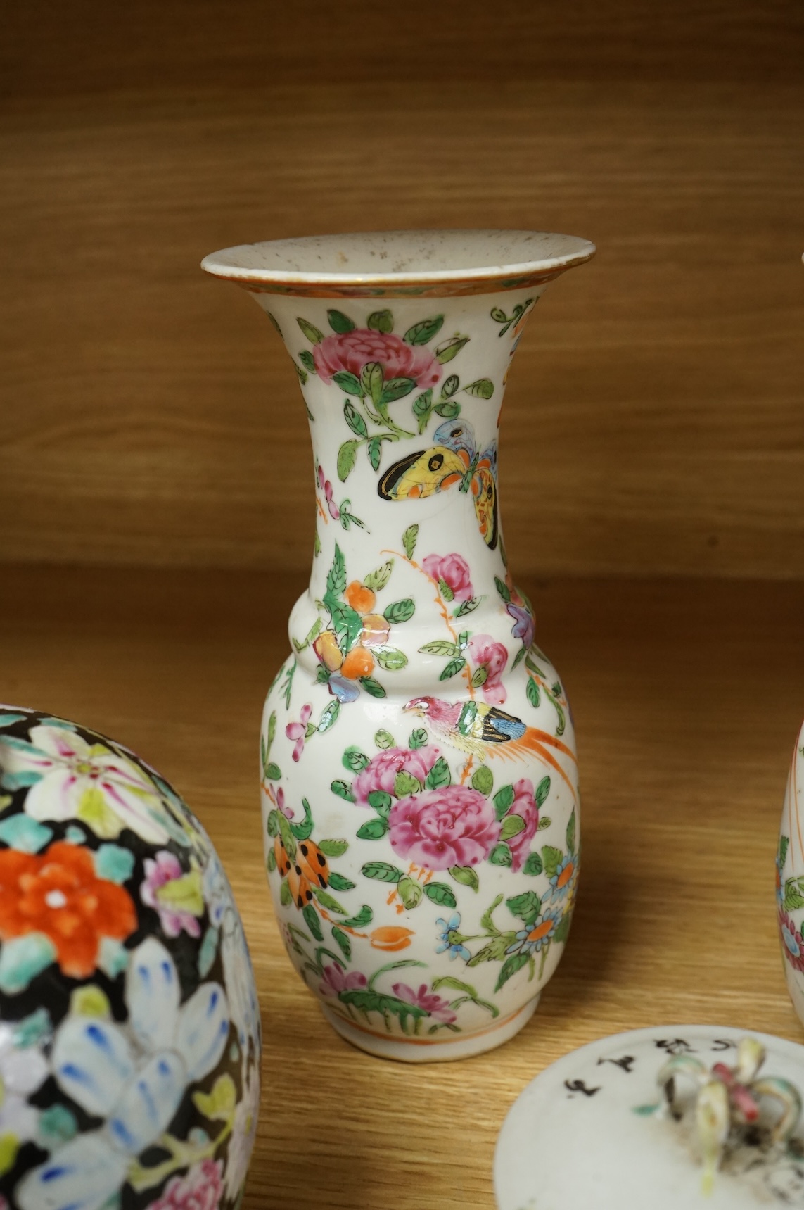 A Chinese 'Thousand Flower' jar, two famille rose vases, and a Republic period jar and cover, largest 19cm high